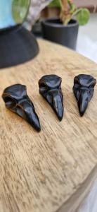 Obsidiaan raaf skelet hoofd